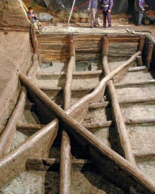wooden structure set into the ground
