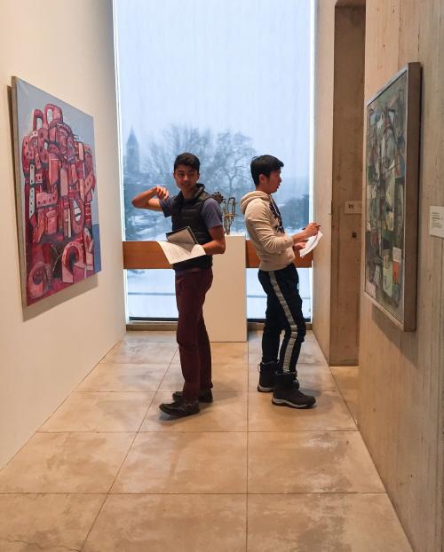 		 College scholars doing an activity at the Johnson Museum 
	
