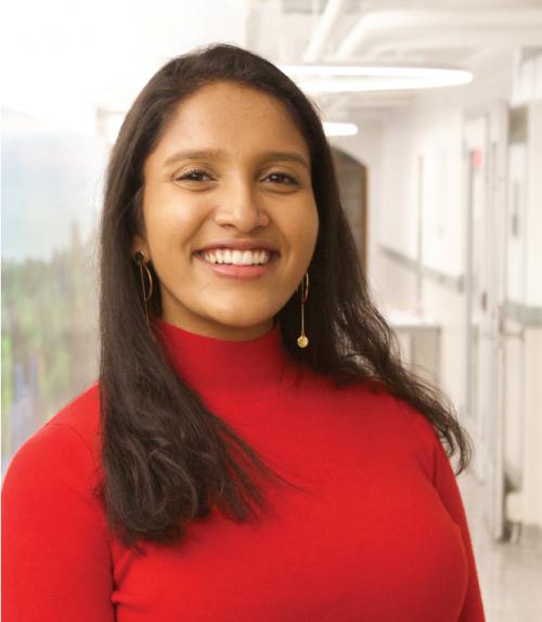 Prameela Kottapall in a red top.
