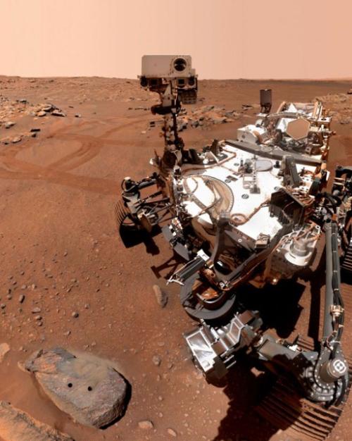 		View from Mars: red landscape and robot
	