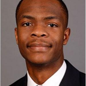 Solomon Lawrence '21 in a suit and tie, portrait style.