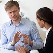 		One person puts off another with a hand gesture
	