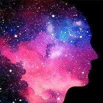 		Fantastilcal ilustration showing a silhouette of a human face in pink, purple and blue celestial light populated by stars
	