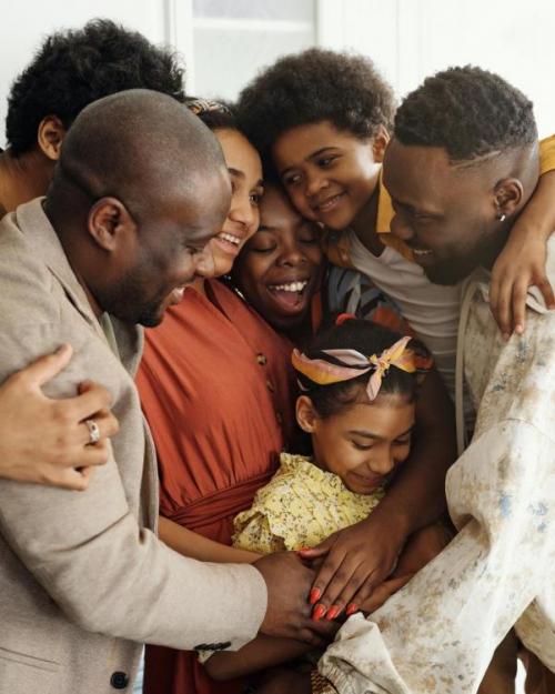 Family gathering for a group hug