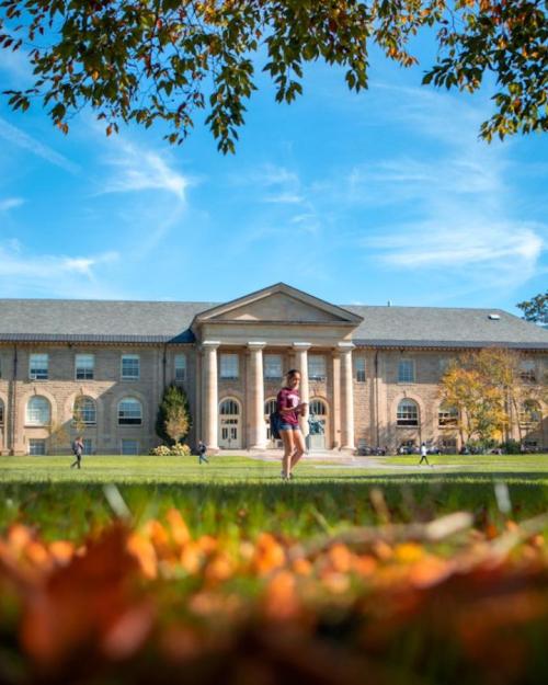 Student on quad in the fall
