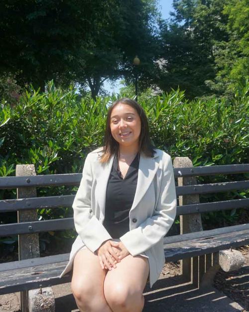 woman sitting on bench