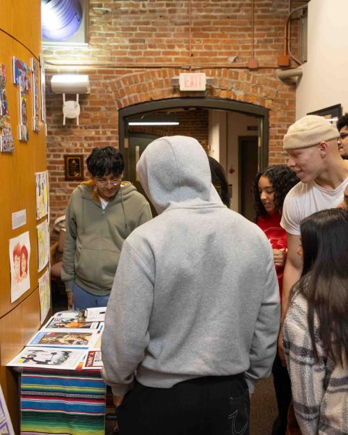 		students looking at a display
	