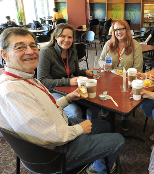  Faculty at a table
