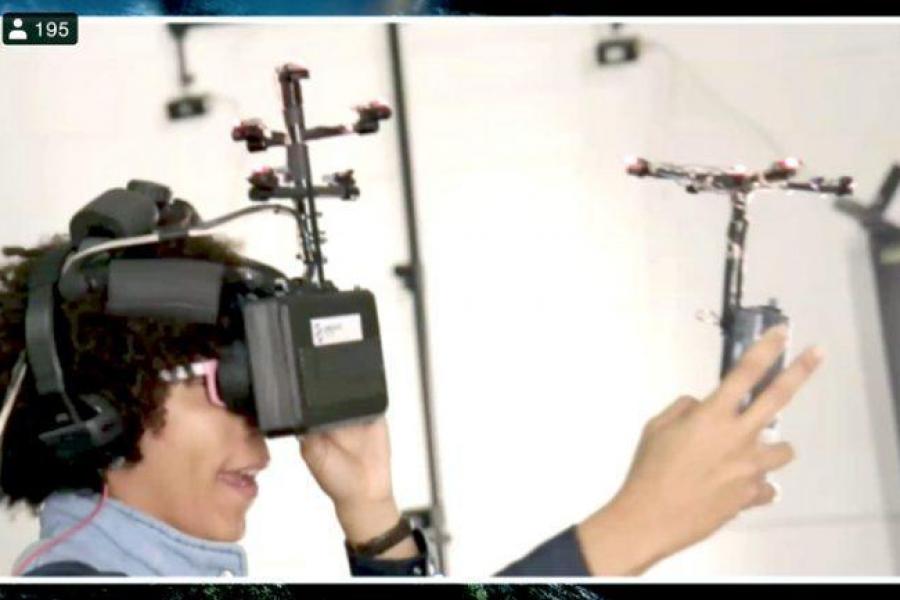 Person wearing XR gear--headset and goggles